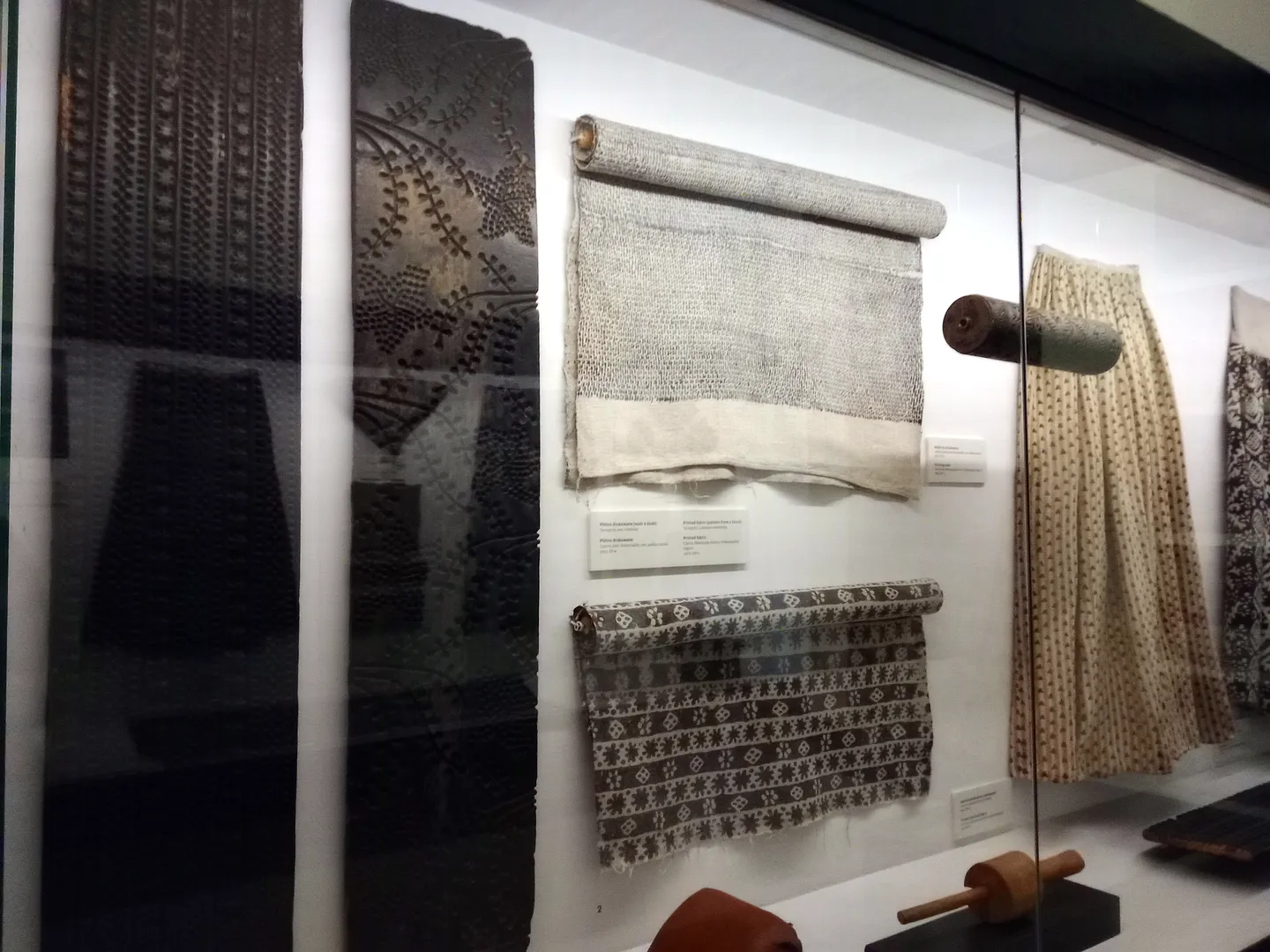 Traditional textile printing tools and fabrics on display